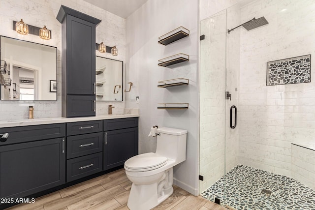 7858 W Fetlock Trl, Peoria, AZ 85383 - full bath featuring a shower stall, wood finished floors, double vanity, and backsplash