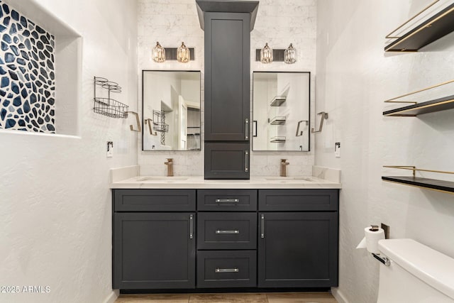 7858 W Fetlock Trl, Peoria, AZ 85383 - full bathroom featuring double vanity, tasteful backsplash, and a textured wall