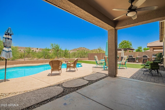 7858 W Fetlock Trl, Peoria, AZ 85383 - view of pool with ceiling fan, a patio area, and a fenced backyard