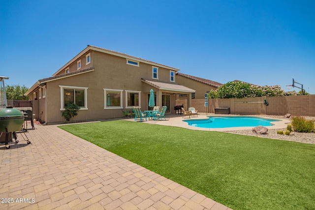 7858 W Fetlock Trl, Peoria, AZ 85383 - view of swimming pool featuring a fenced backyard, a patio area, and area for grilling