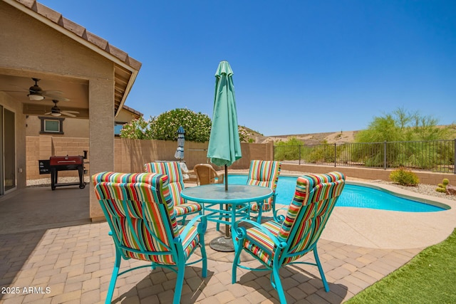 7858 W Fetlock Trl, Peoria, AZ 85383 - view of pool with a patio, a fenced backyard, and ceiling fan