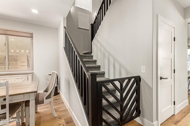 7858 W Fetlock Trl, Peoria, AZ 85383 - staircase featuring wood finished floors and recessed lighting