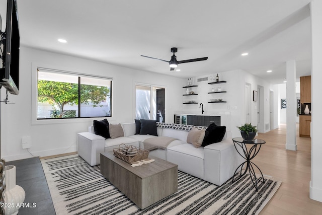 10360 N 98th St, Scottsdale, AZ 85258 - living area with recessed lighting, light wood finished floors, ceiling fan, and baseboards