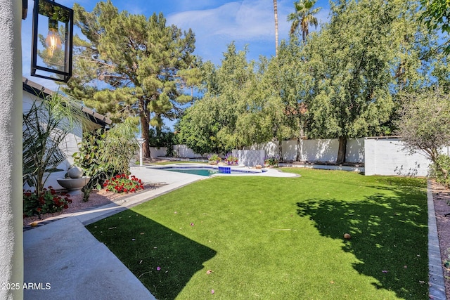 10360 N 98th St, Scottsdale, AZ 85258 - view of yard featuring a fenced in pool, a fenced backyard, and a patio