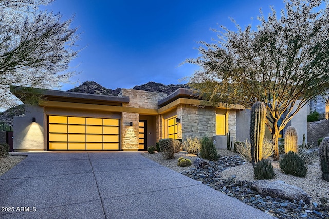 view of front of home with a garage