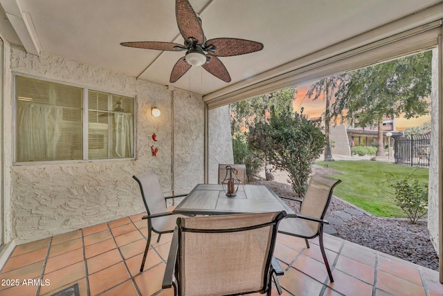 7625 E Camelback Rd Unit B138, Scottsdale, AZ 85251 - patio terrace at dusk with ceiling fan, a patio, and outdoor dining space