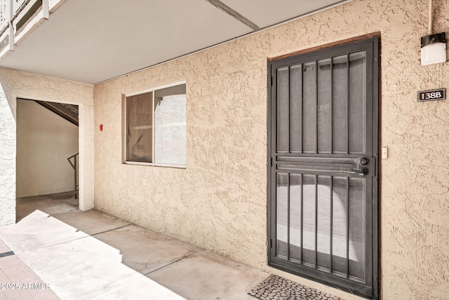 7625 E Camelback Rd Unit B138, Scottsdale, AZ 85251 - view of exterior entry with stucco siding