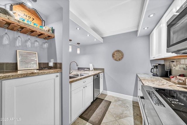 7625 E Camelback Rd Unit B138, Scottsdale, AZ 85251 - kitchen with stainless steel appliances, a sink, recessed lighting, white cabinetry, and light stone countertops