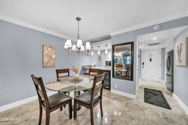 7625 E Camelback Rd Unit B138, Scottsdale, AZ 85251 - dining space featuring a chandelier, ornamental molding, and baseboards