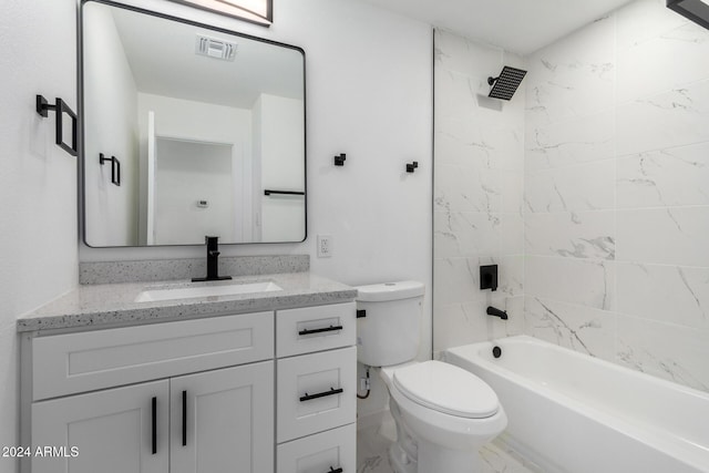 full bathroom featuring toilet, vanity, and tiled shower / bath combo