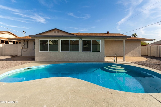 view of pool featuring a patio