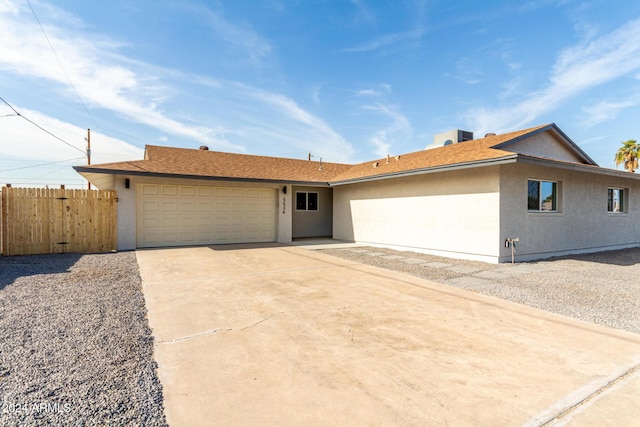 single story home with a garage