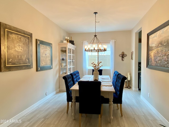 dining room featuring a chandelier