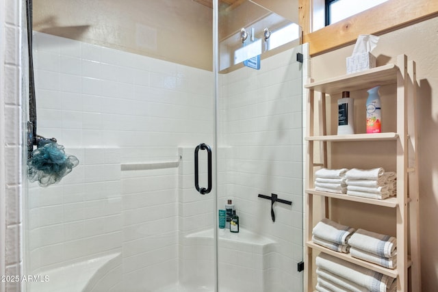 bathroom with a stall shower