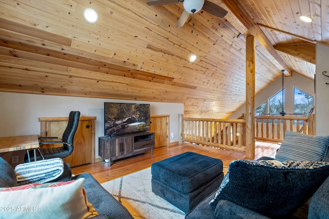 living area featuring light wood finished floors, wood ceiling, lofted ceiling with beams, and a ceiling fan