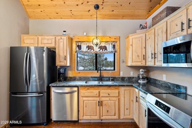 kitchen with light brown cabinetry, wooden ceiling, stainless steel appliances, and a sink