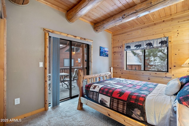 carpeted bedroom featuring beam ceiling, wood walls, wooden ceiling, and access to outside