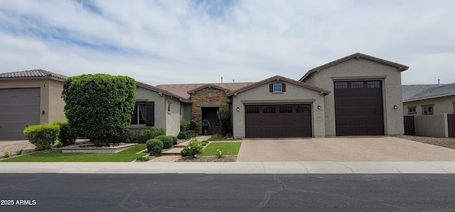 9187 W Parkside Ln, Peoria, AZ 85383 - ranch-style house with a garage, stucco siding, and driveway