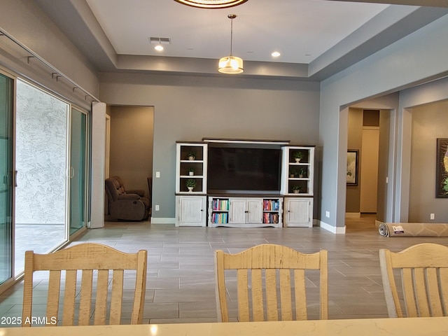 9187 W Parkside Ln, Peoria, AZ 85383 - living room with a tray ceiling and baseboards