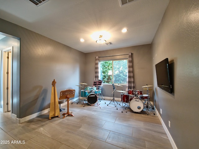 9187 W Parkside Ln, Peoria, AZ 85383 - playroom with baseboards