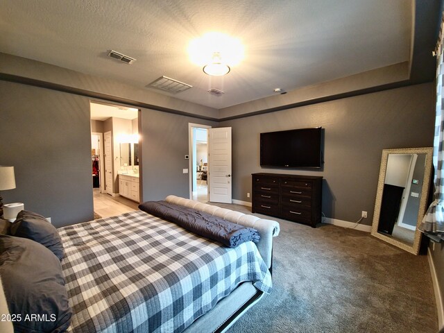9187 W Parkside Ln, Peoria, AZ 85383 - bedroom featuring baseboards, light carpet, and ensuite bath