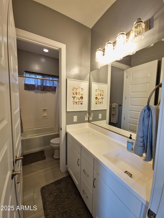9187 W Parkside Ln, Peoria, AZ 85383 - full bath featuring vanity, toilet, and shower / bath combo with shower curtain