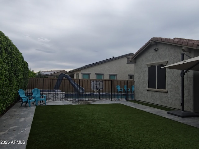 9187 W Parkside Ln, Peoria, AZ 85383 - view of yard with a patio area