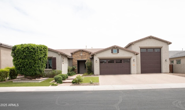 9187 W Parkside Ln, Peoria, AZ 85383 - ranch-style house featuring an attached garage, stucco siding, concrete driveway, and stone siding