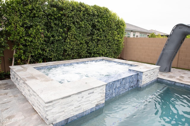 9187 W Parkside Ln, Peoria, AZ 85383 - view of pool with an in-ground hot tub
