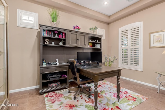 20556 W Point Ridge Rd, Buckeye, AZ 85396 - home office featuring light tile patterned floors, recessed lighting, and baseboards