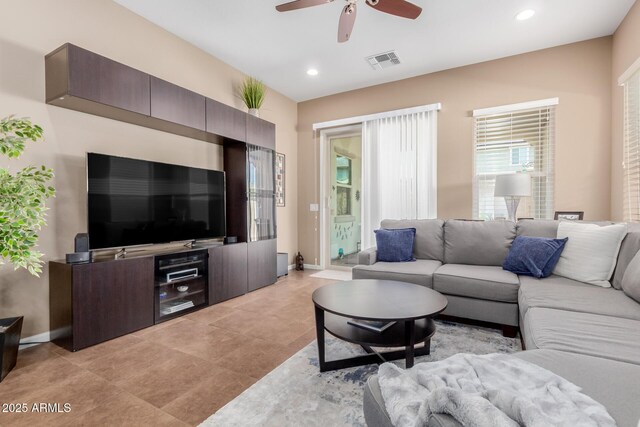20556 W Point Ridge Rd, Buckeye, AZ 85396 - living room with a ceiling fan, recessed lighting, baseboards, and light tile patterned floors