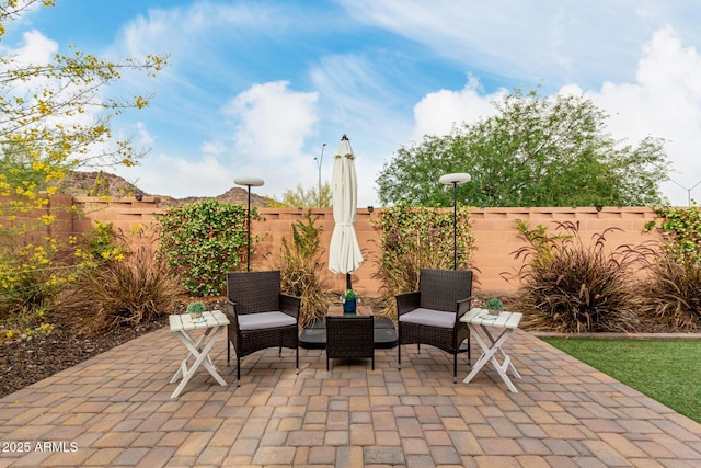 view of patio featuring a fenced backyard