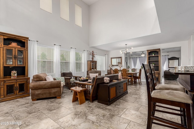 living room featuring a high ceiling