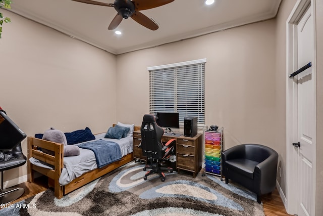 bedroom with recessed lighting, a ceiling fan, baseboards, and wood finished floors