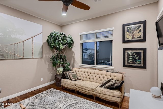 living room with a ceiling fan, visible vents, wood finished floors, baseboards, and recessed lighting