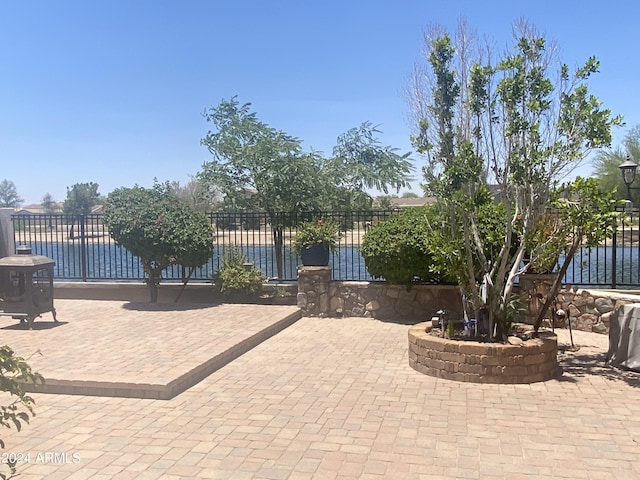 view of patio featuring fence