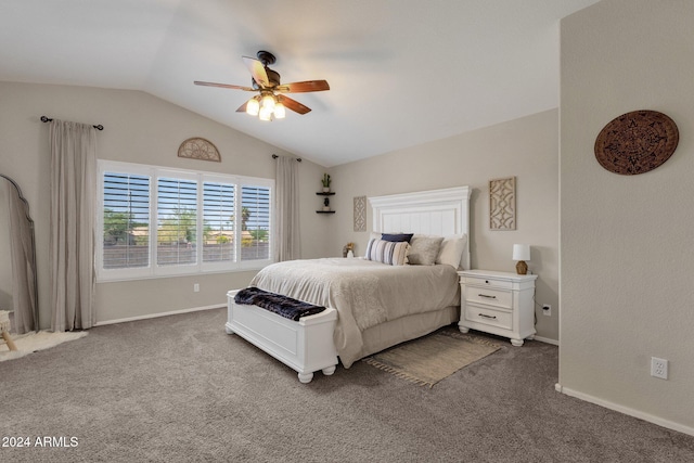 carpeted bedroom featuring ceiling fan and vaulted ceiling