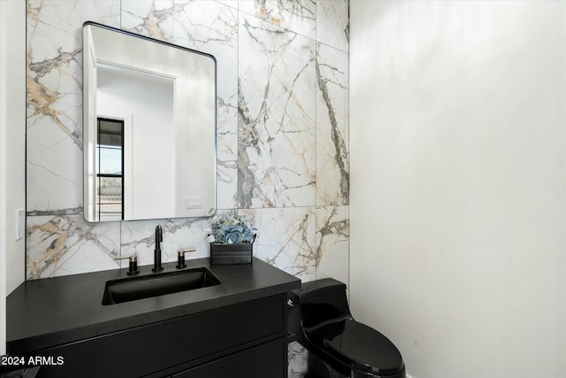 interior space featuring decorative backsplash and vanity