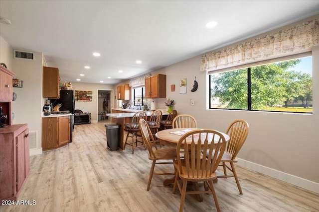 dining area with recessed lighting, visible vents, baseboards, and light wood-style floors