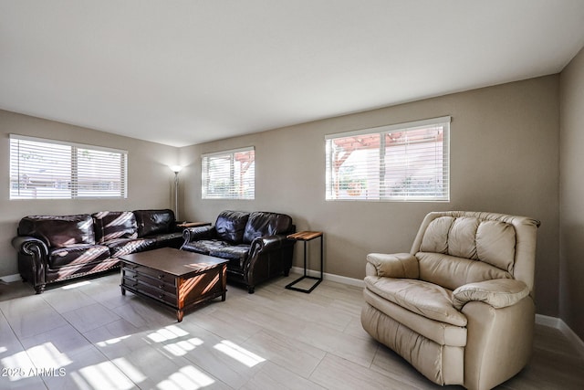 tiled living room featuring plenty of natural light