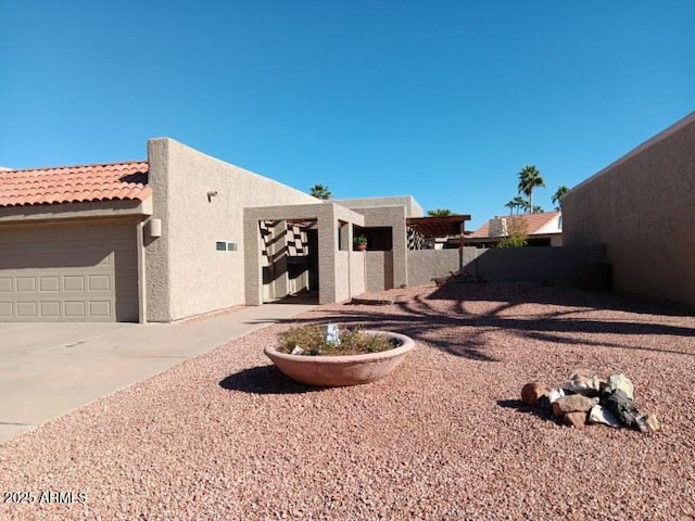 view of side of home with a garage