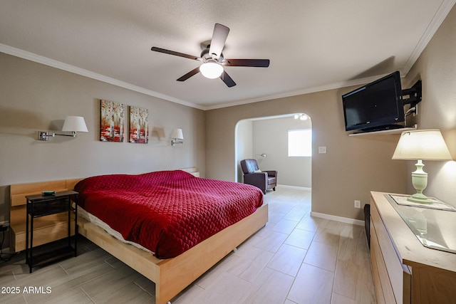 bedroom featuring ceiling fan and crown molding