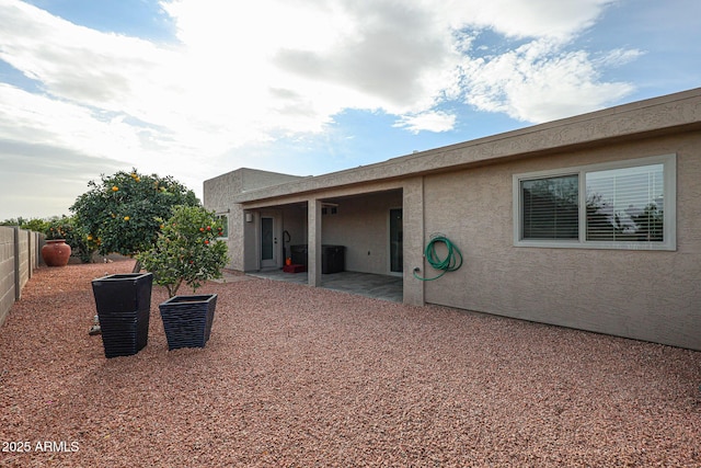 rear view of property with a patio