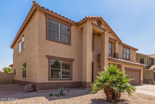 11511 E Renata Ave, Mesa, AZ 85212 - view of front facade with driveway, stucco siding, a tile roof, and an attached garage