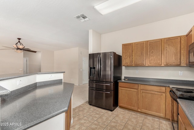 11511 E Renata Ave, Mesa, AZ 85212 - kitchen with stainless steel fridge with ice dispenser, black range with electric stovetop, dark countertops, and a ceiling fan