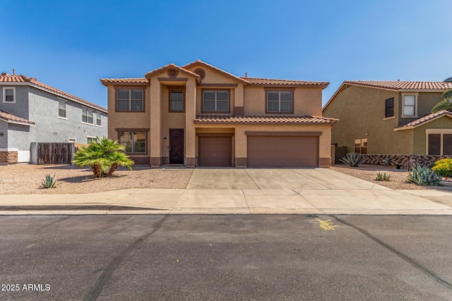 11511 E Renata Ave, Mesa, AZ 85212 - view of front of house featuring a garage, driveway, stucco siding, and a tile roof