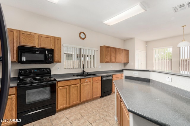 11511 E Renata Ave, Mesa, AZ 85212 - kitchen featuring black appliances, a sink, and brown cabinets