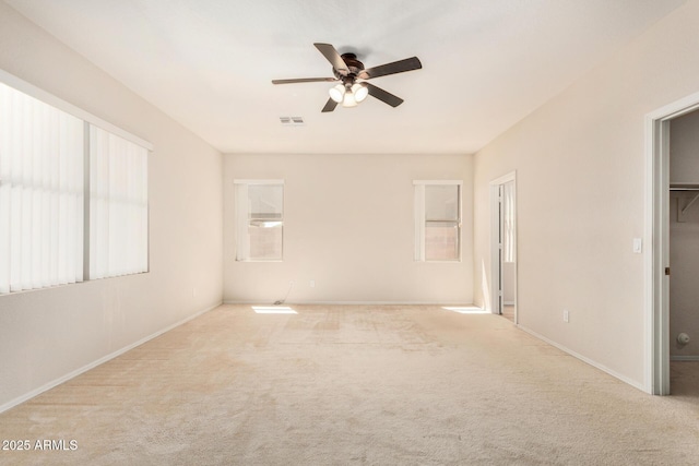 11511 E Renata Ave, Mesa, AZ 85212 - carpeted empty room with a ceiling fan, plenty of natural light, and baseboards