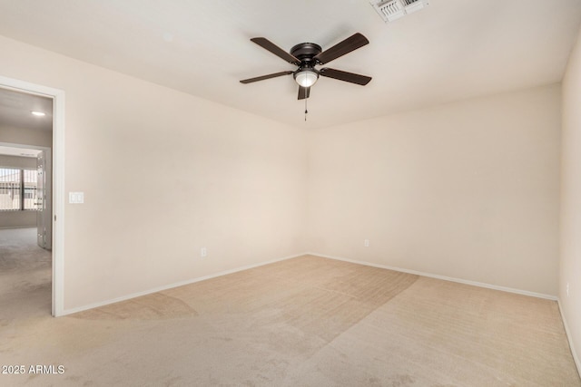 11511 E Renata Ave, Mesa, AZ 85212 - spare room with light carpet, a ceiling fan, and baseboards