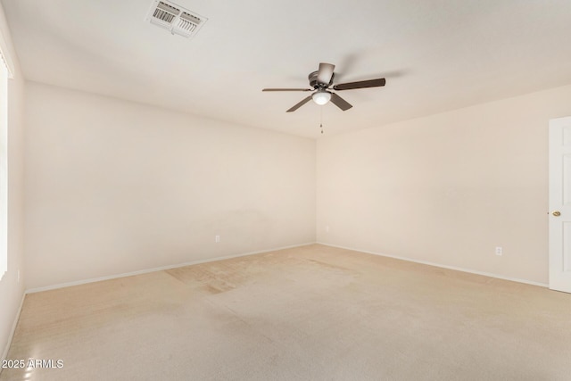 11511 E Renata Ave, Mesa, AZ 85212 - spare room featuring a ceiling fan, light carpet, and baseboards